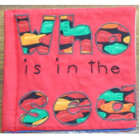 An applique pattern for a book cover